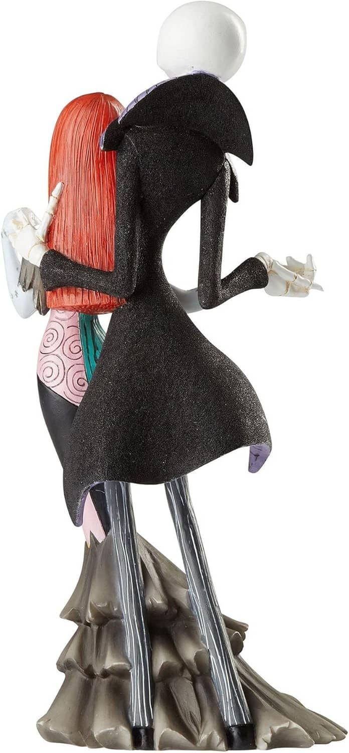 Jack and Sally-style figurine couple, side view with black character and red-haired Sally