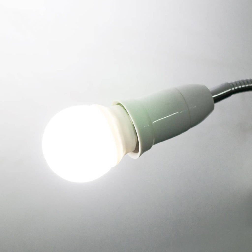Flexible lamp extender with a lit bulb and white socket holder on the gooseneck