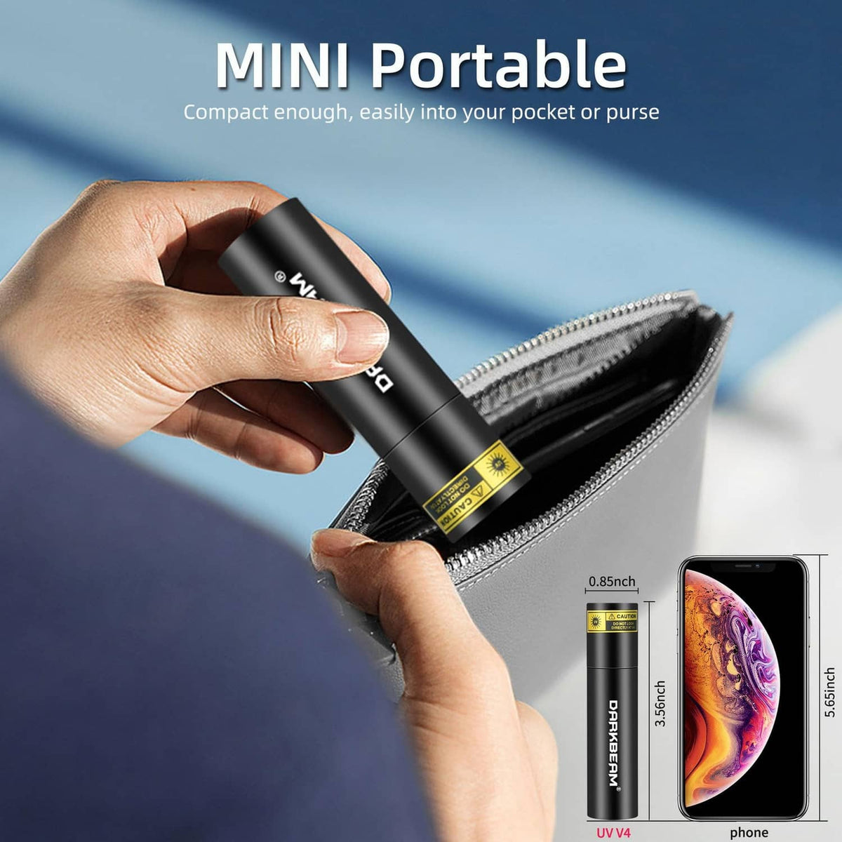 Black mini 365nm UV flashlight held near smartphone for size comparison