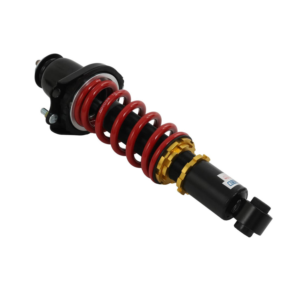 Coilover strut with black shock body, red spring, gold adjustment collar, side bushing