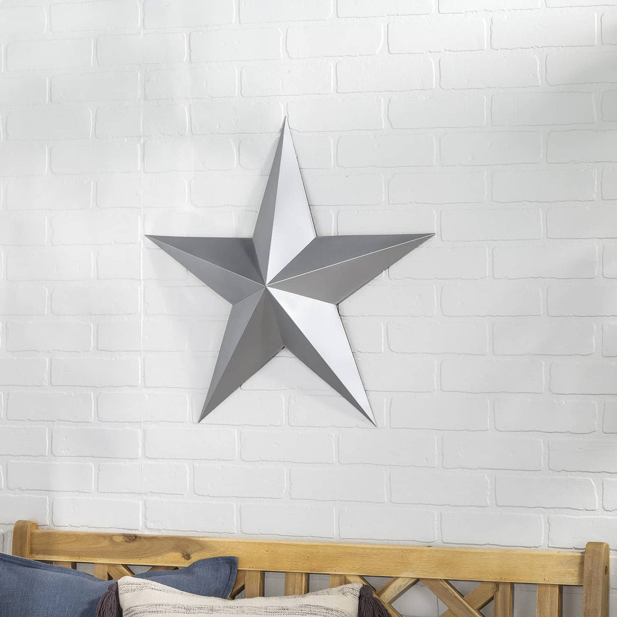 Metallic silver star wall decoration with sharp geometric points