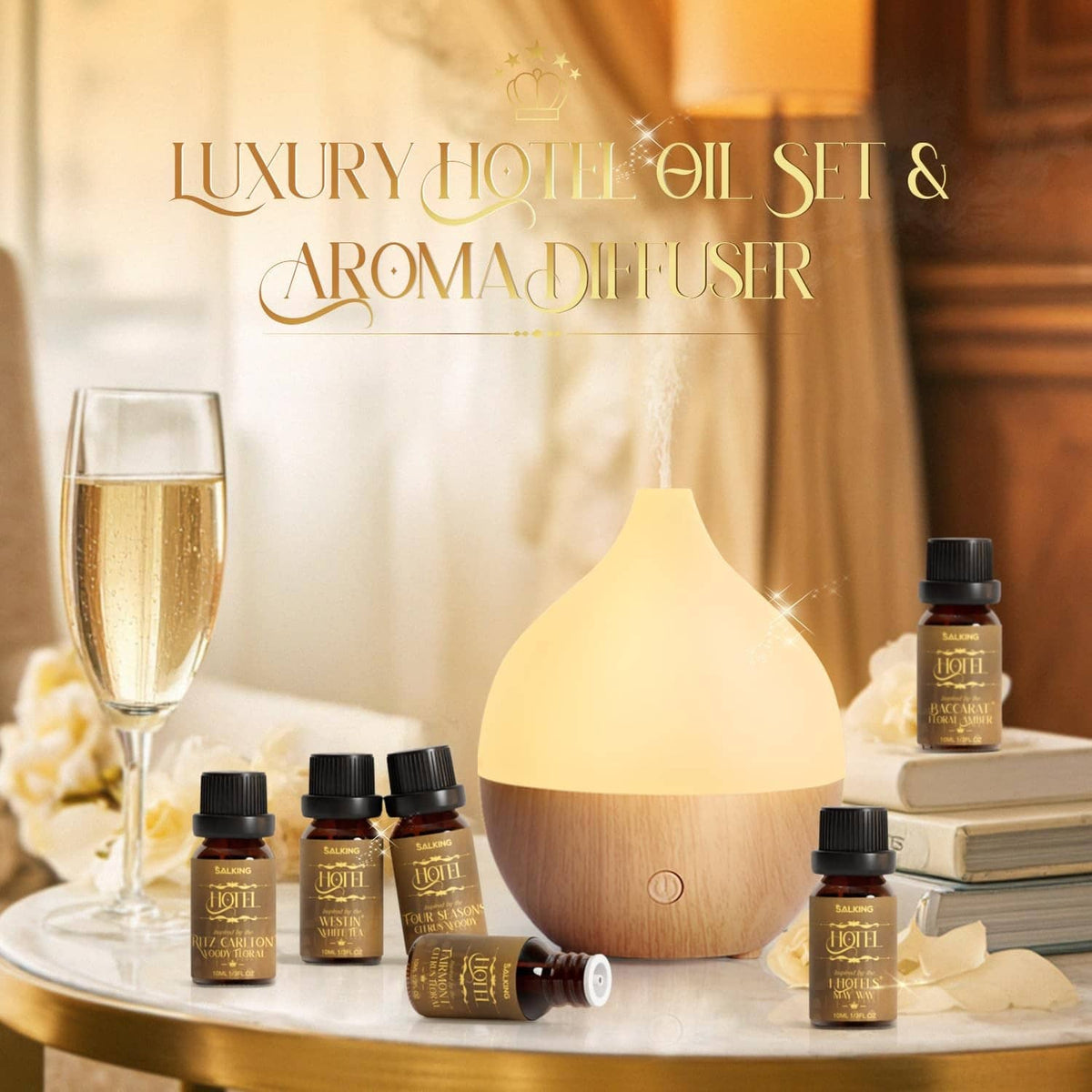 Droplet essential oil diffuser with warm glow, plus four included hotel aroma oil bottles