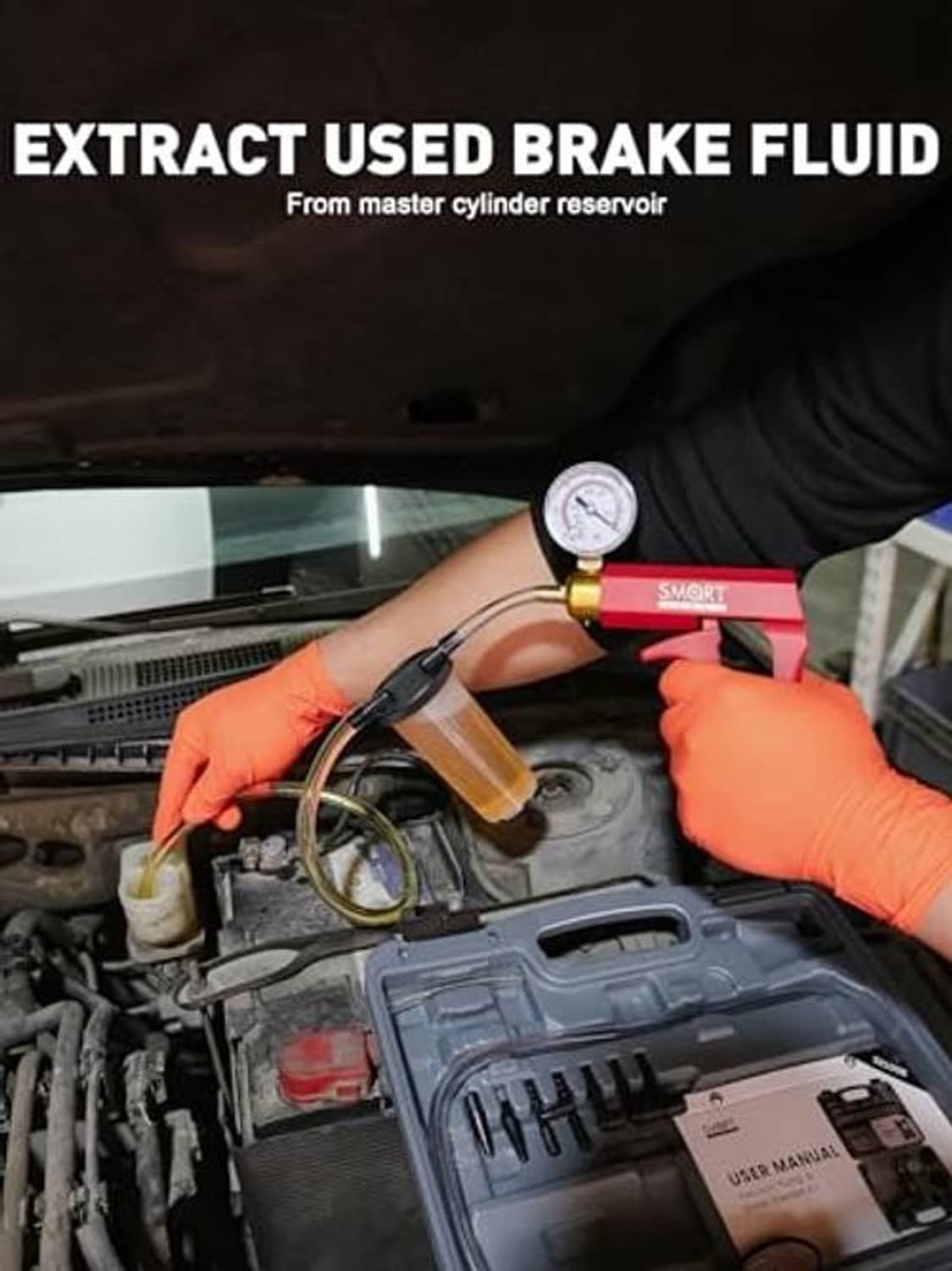 Brake bleeder kit vacuum pump with pressure gauge being used in a car engine bay