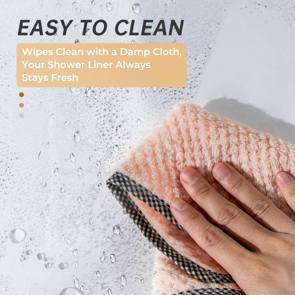 White shower curtain liner being wiped clean with water droplets on fabric
