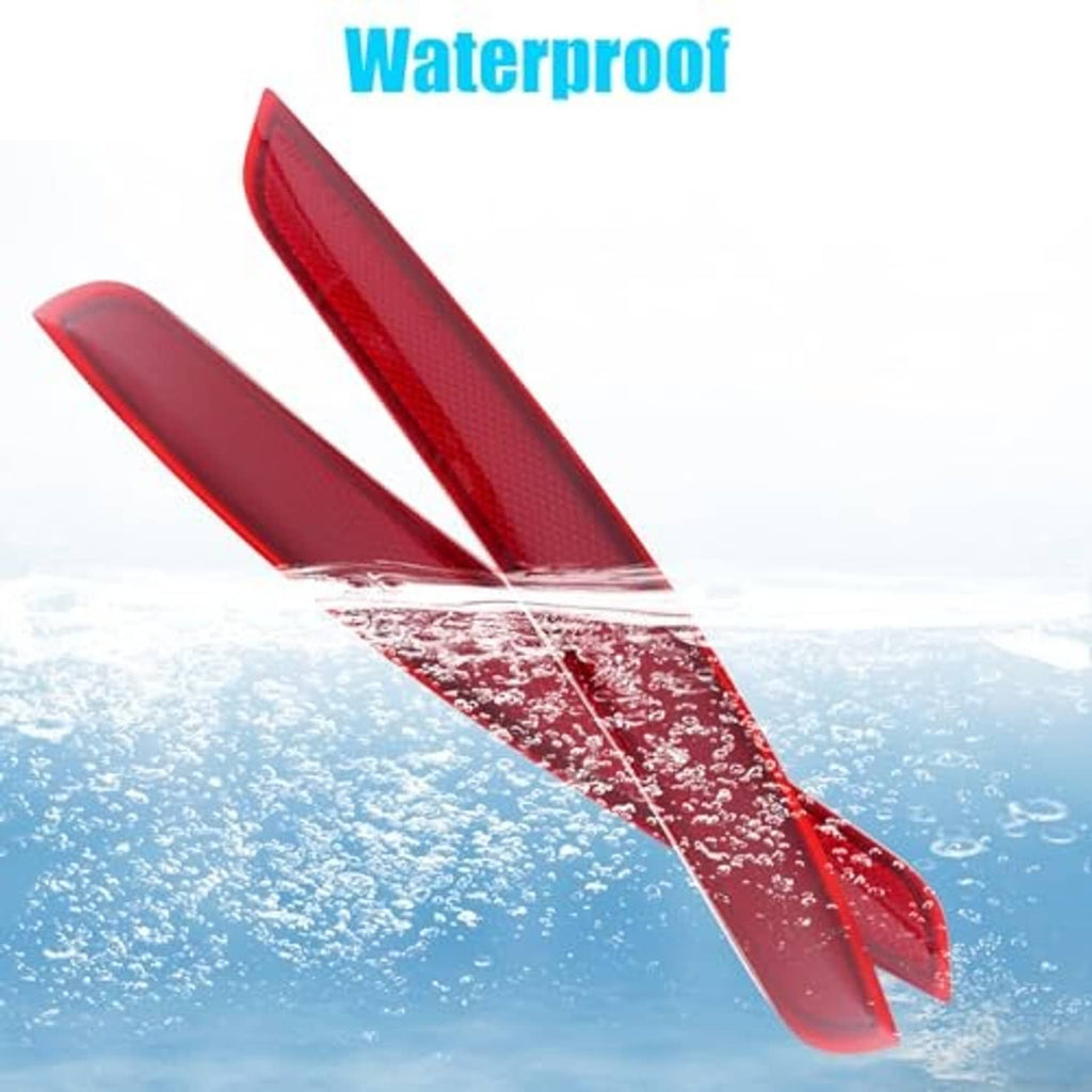 Red waterproof rear bumper reflector light lens on white background