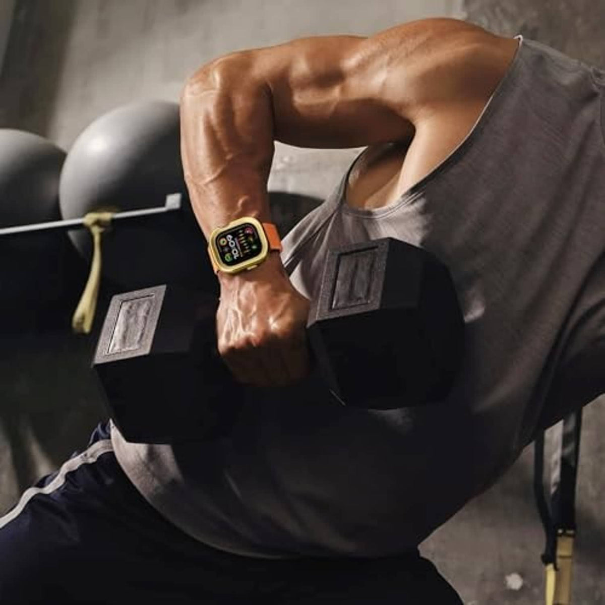 Rose gold metal smartwatch case on smartwatch with dark band