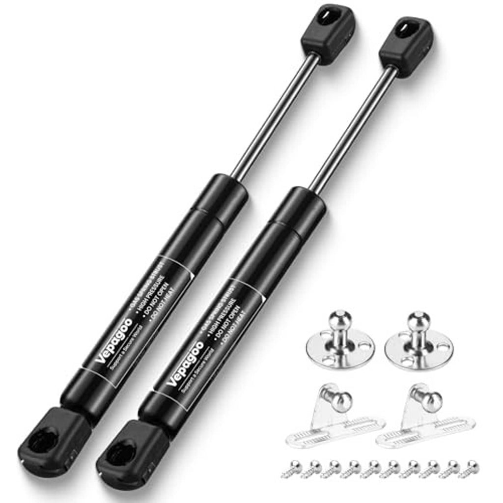 Two black gas lift struts with mounting brackets, screws, and round plate hardware.