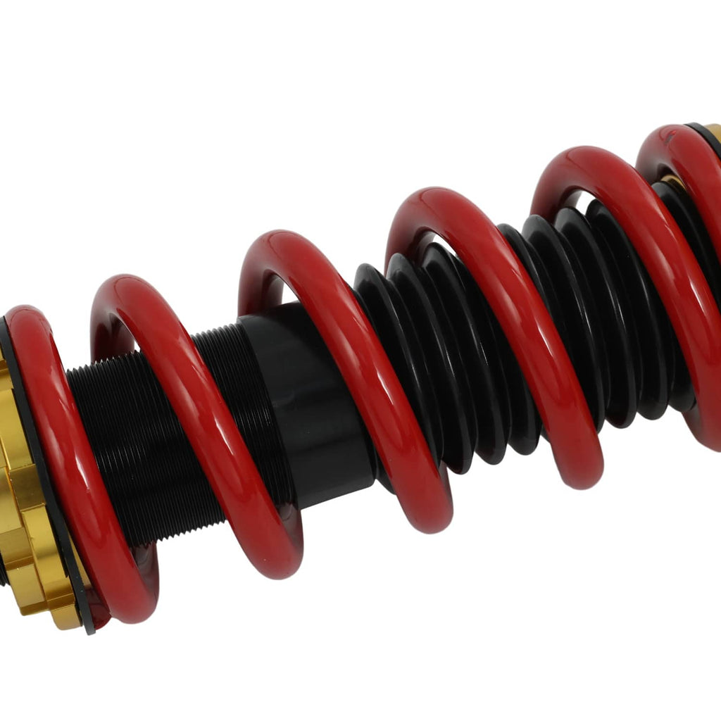 Coilover strut assembly with red spring over black shock body