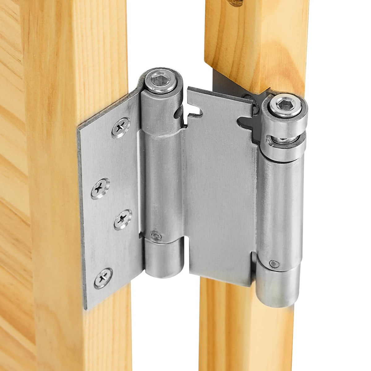 Metal hinge hardware on pine wood saloon swinging door