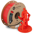 Red ABS filament spool with red 3D-printed figurine