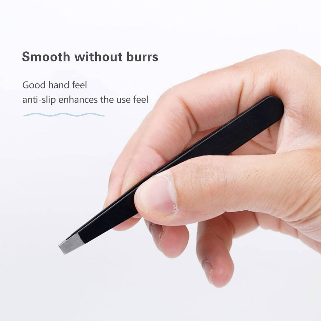 Black slant-tip tweezers held in hand for smooth hair removal