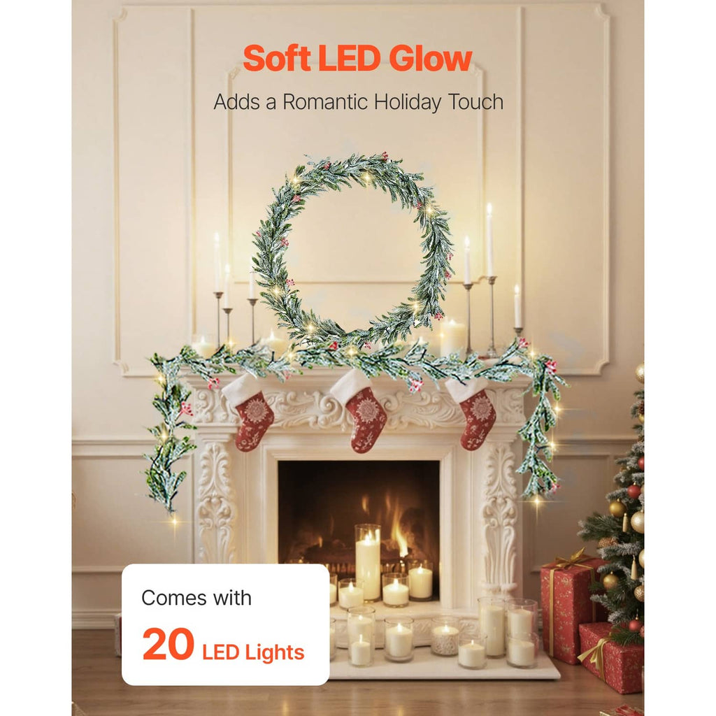 Pre-lit Christmas garland with olive leaves, red berries, and soft LED glow over a mantel