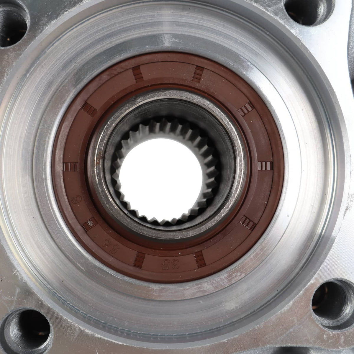 Rear differential gear case close-up of inner splined hub with brown seal and metal ring