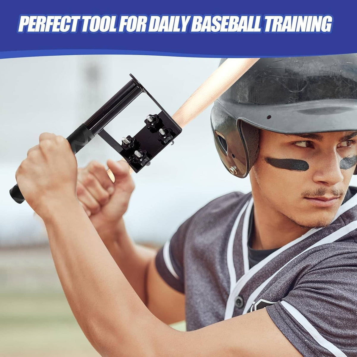 Man using a baseball swing trainer with a black bracket mounted on the bat