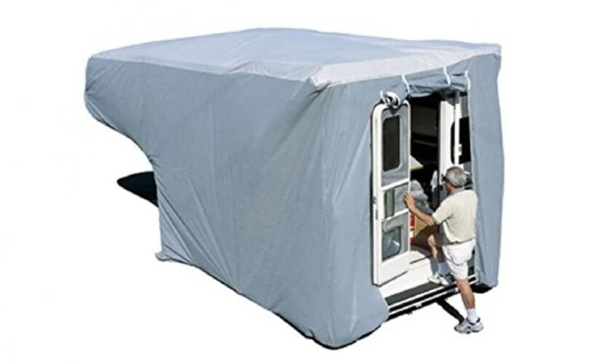 Aqua truck camper cover draped over camper body, front-side door opening