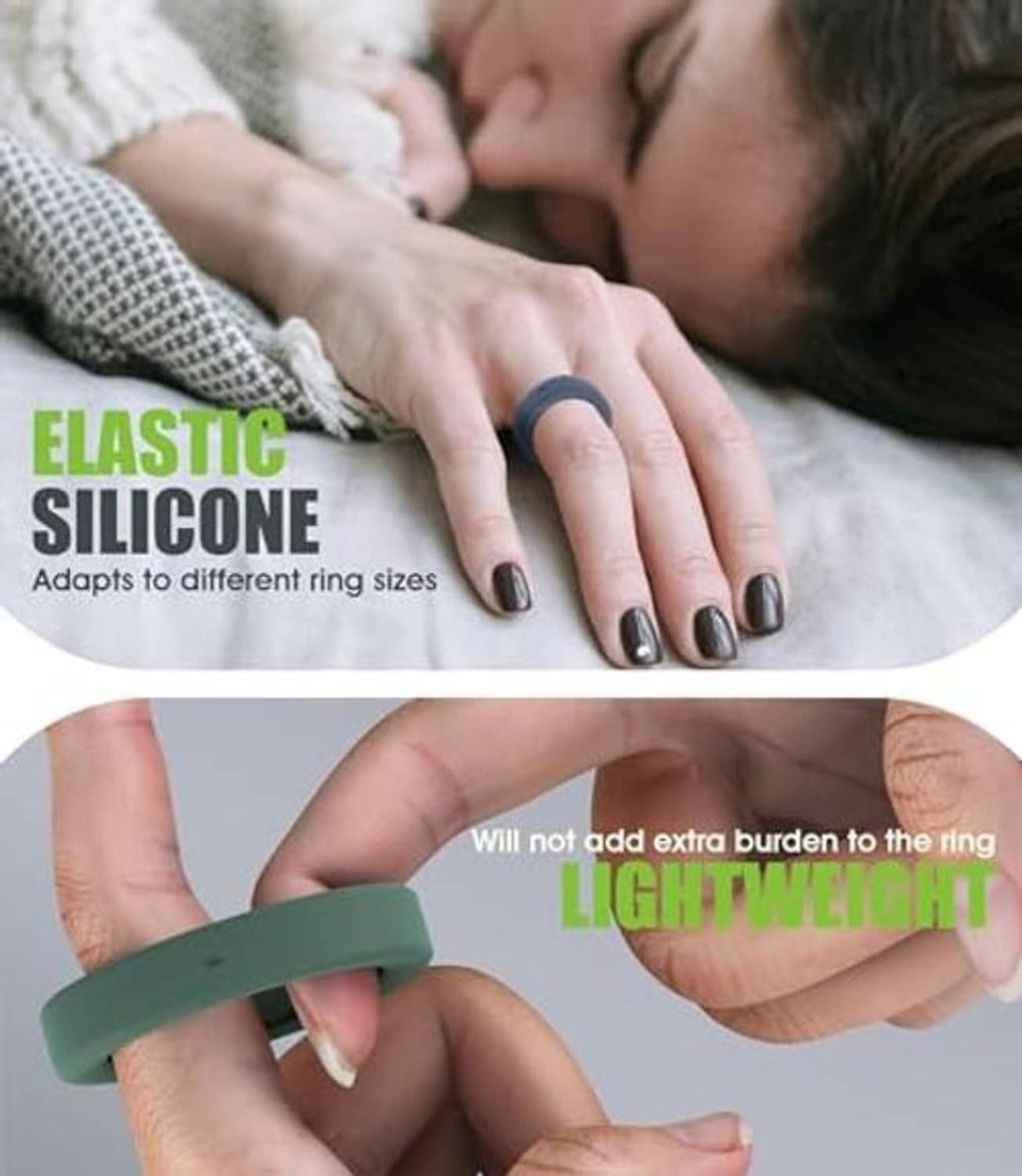Light green elastic silicone ring cover on fingers, flexible lightweight protective band.