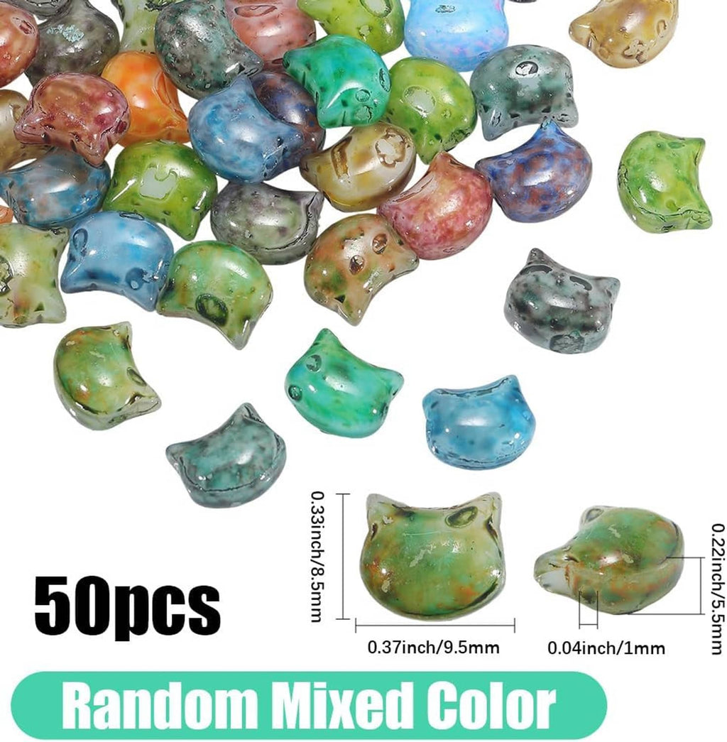 Mixed set of cat-shaped glass beads in multiple colors, each bead has a hole.