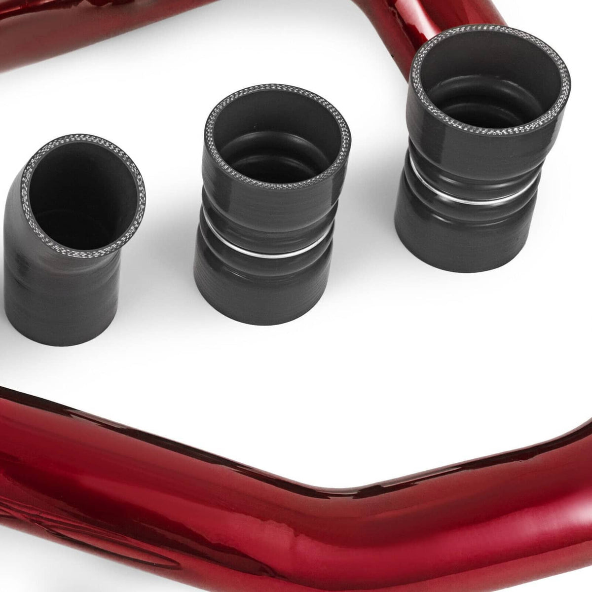 Red intercooler pipe with attached black rubber boots and silver clamp rings