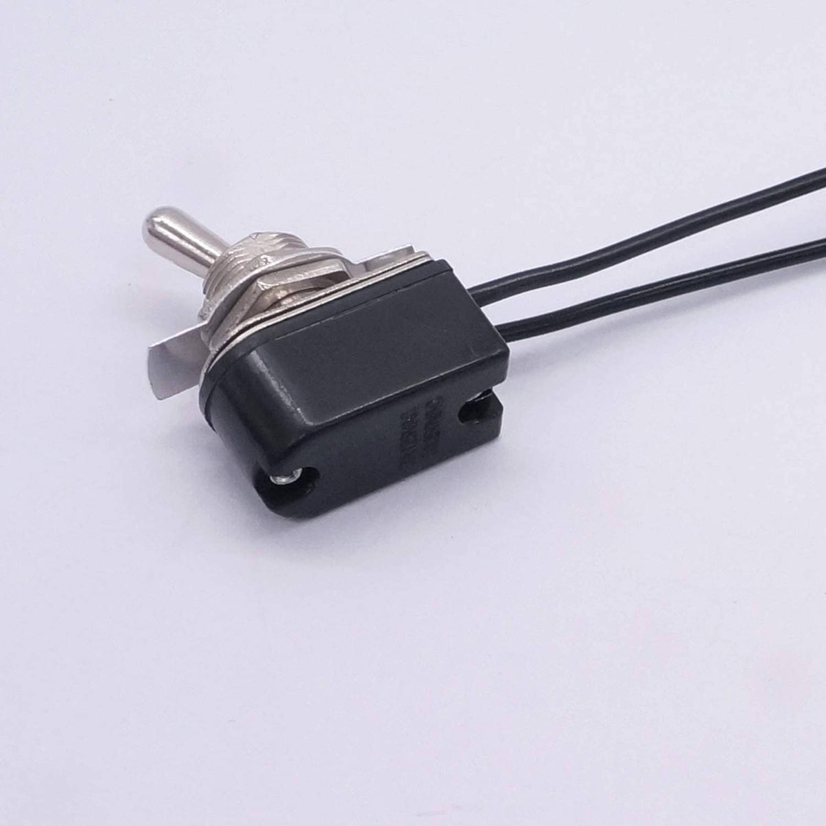 Single SPST toggle switch with metal lever actuator and black wire leads