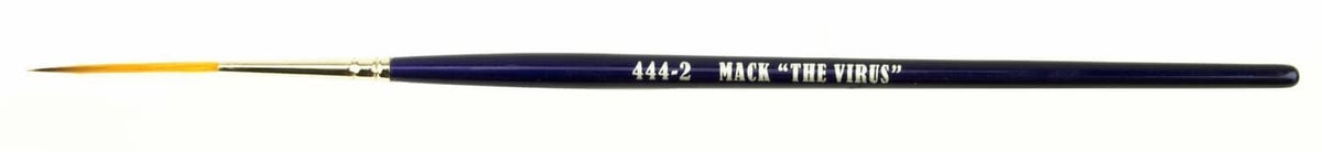 Paintbrush with navy handle and gold ferrule, printed shaft text visible