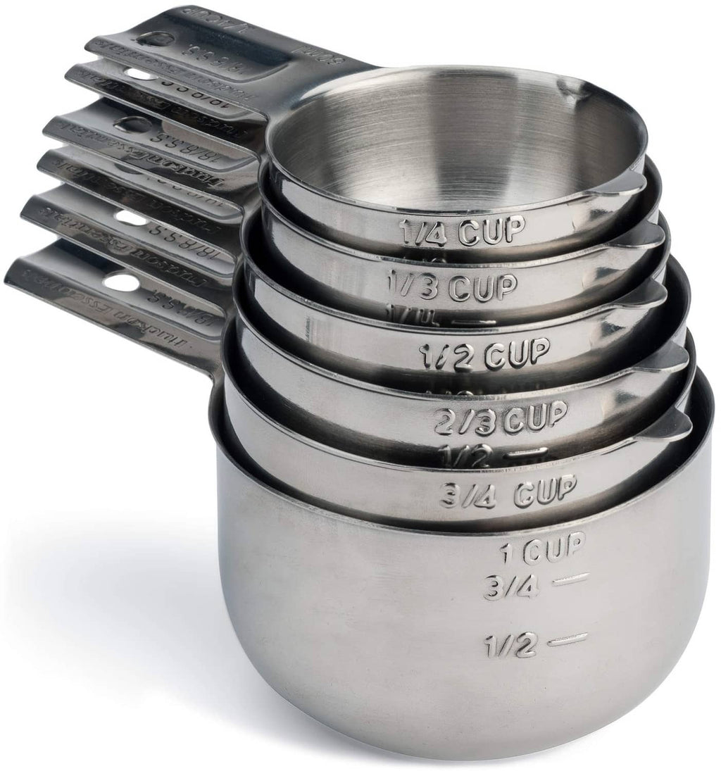 Stainless steel measuring cup set with labeled 1/4 to 1 cup sizes
