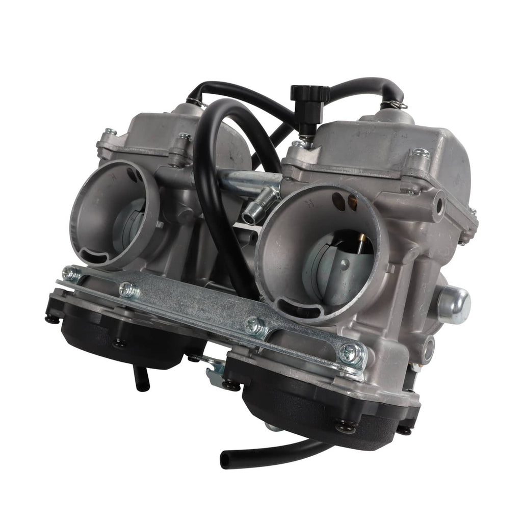 Carburetor with two round intake ports, metal base plate, and black hose loops