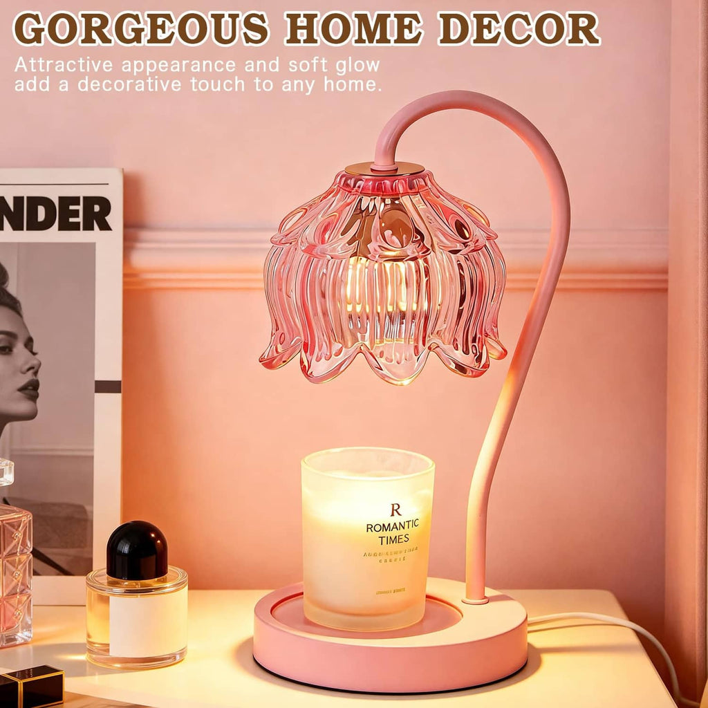 Pink candle warmer lamp with flower glass shade and lit jar candle