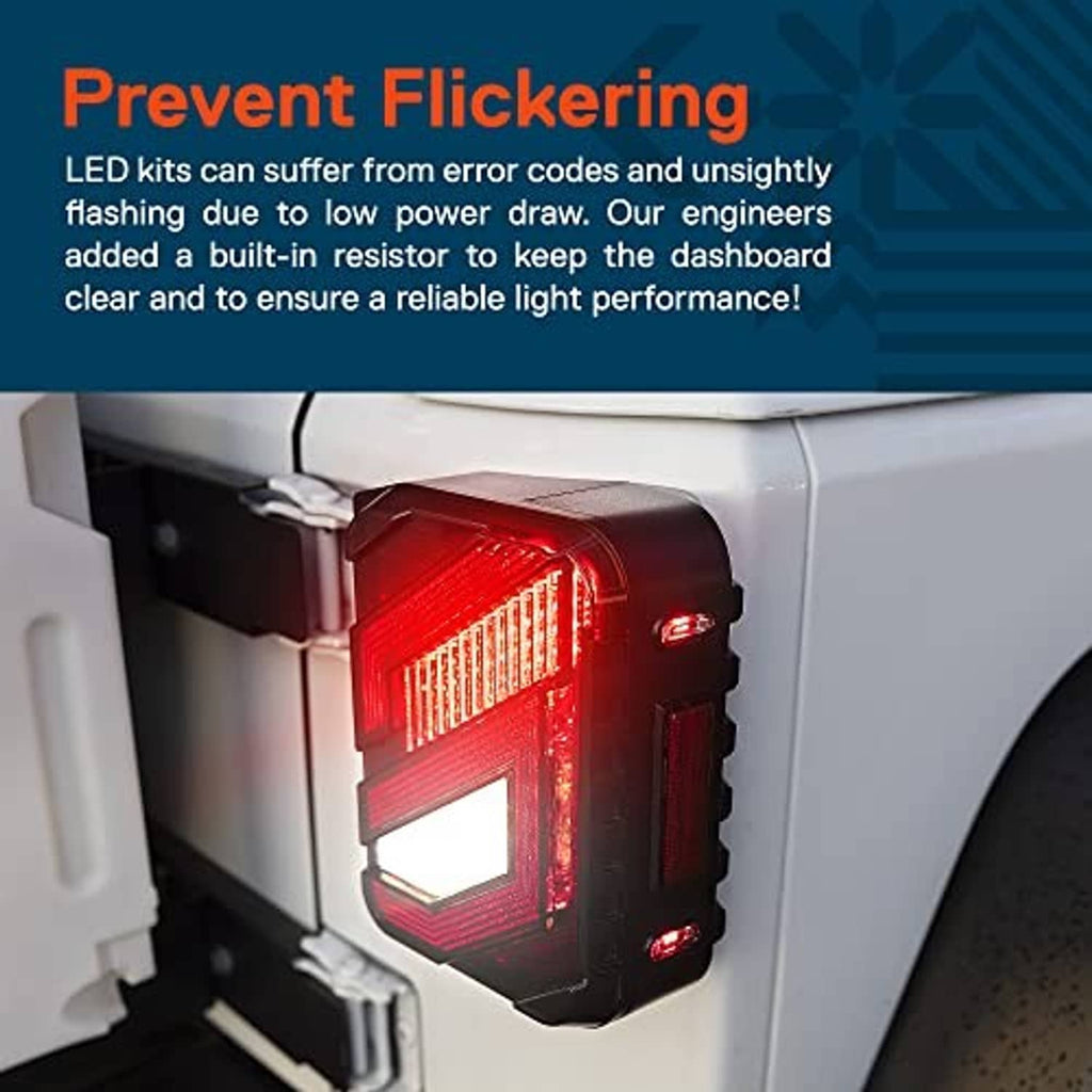 Close-up of illuminated smoked LED tail light with bright red light segments