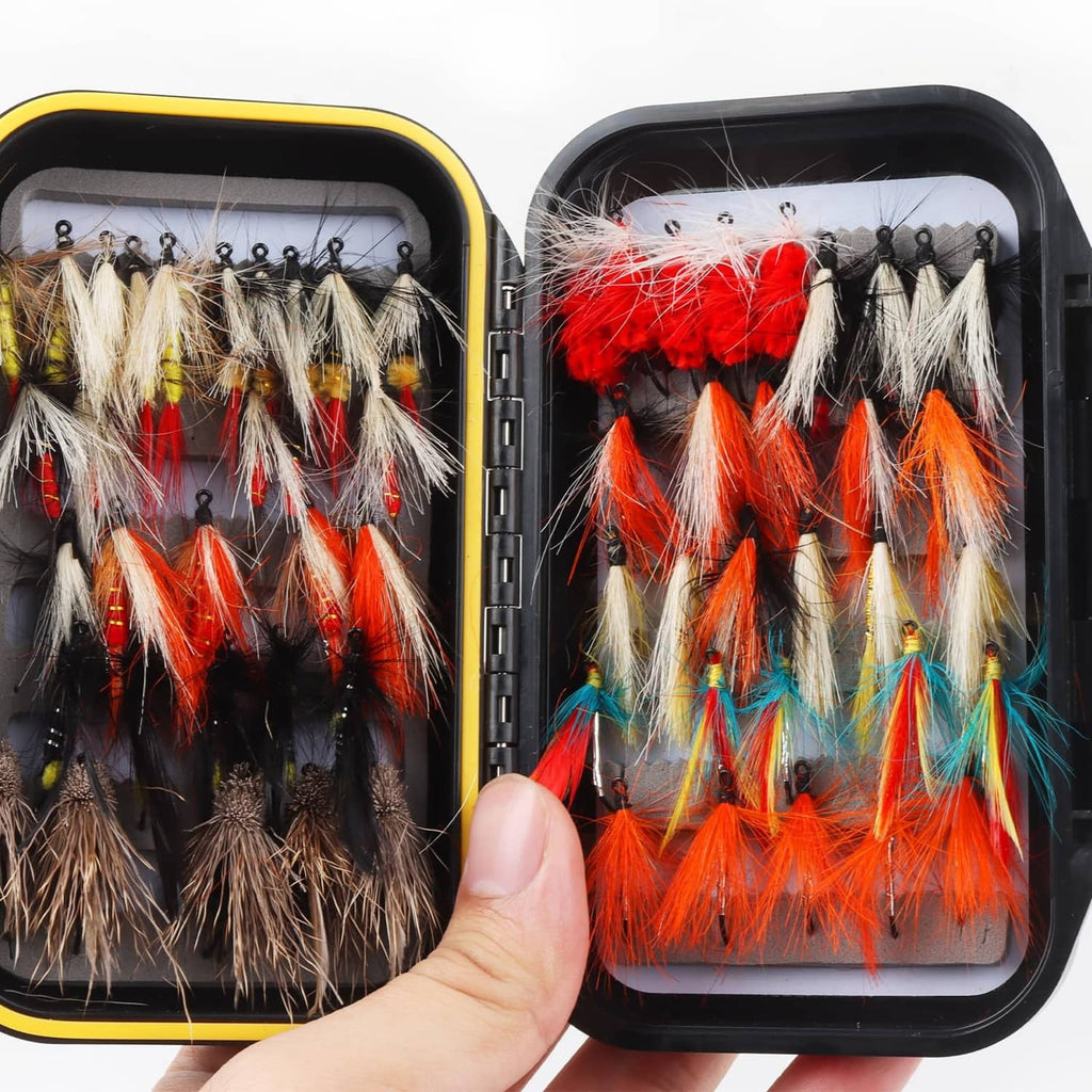 Waterproof fly box holding orange, red, and white feather streamer flies on hooks