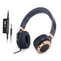 Over-ear noise cancelling headphones with cushioned earcups and attached microphone cable