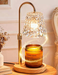 Diamond-cut candle warmer lamp with gold stand and glowing candle jar on base