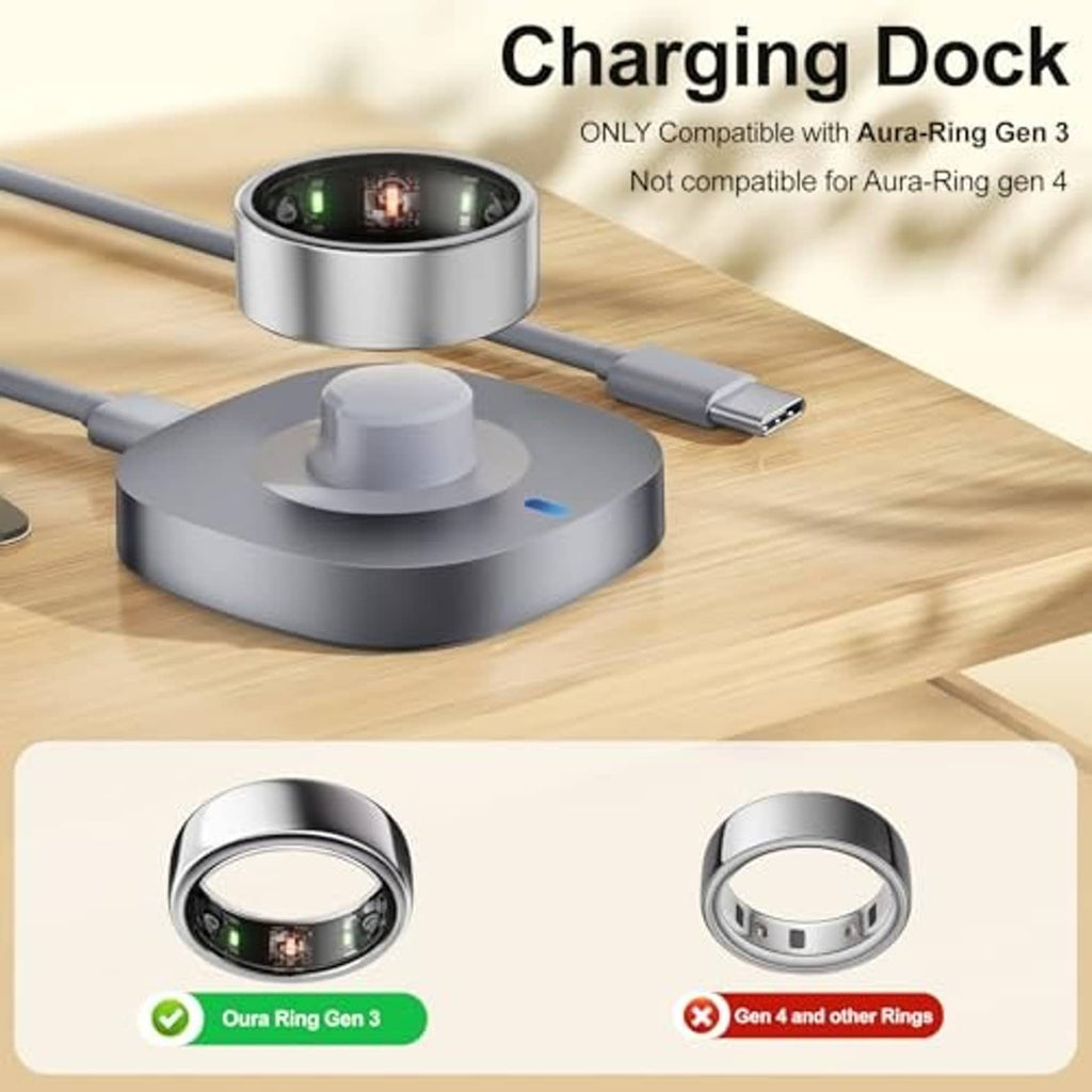 Gray charging dock with central cradle and USB-C cable on a wooden surface