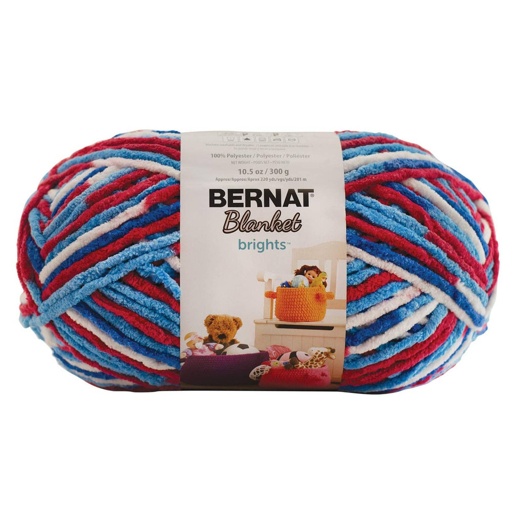 Super bulky bright red and blue striped Bernat Blanket yarn skein with label