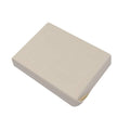 Light beige seat back cover with molded rectangular panel and small side opening