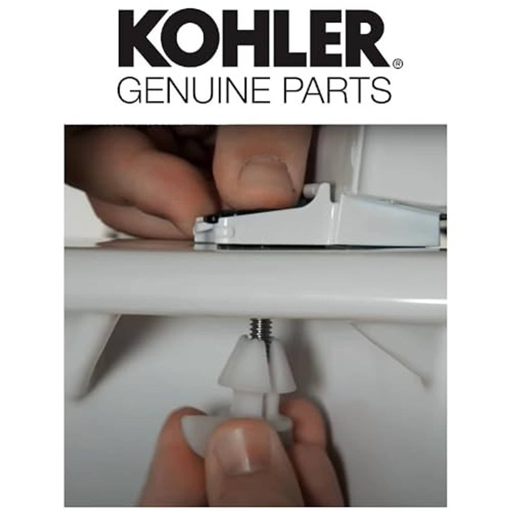 Hand installing Kohler bumper hardware kit screw and white clip on a white toilet tank