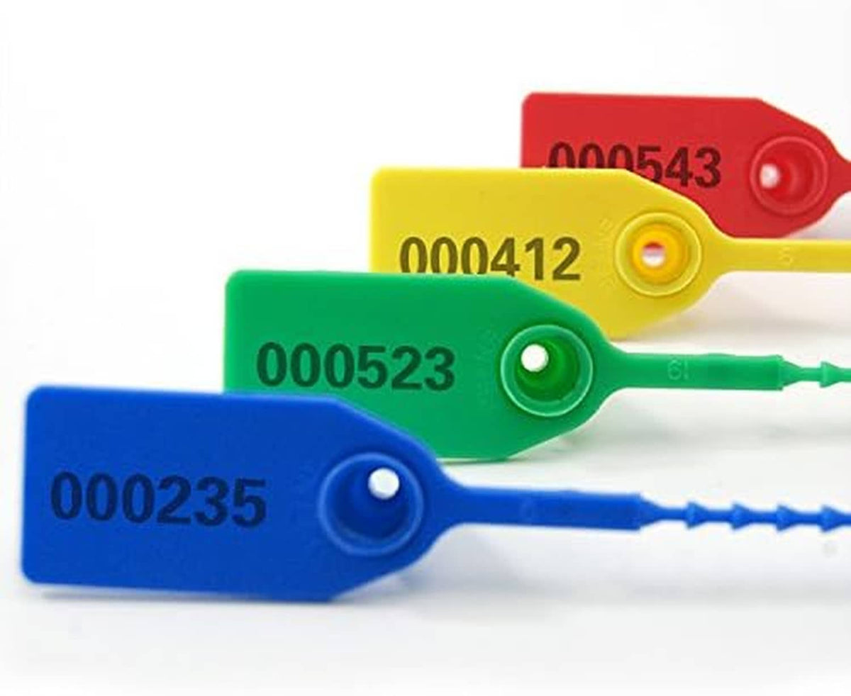 Colored plastic tamper seals on zip ties: blue, green, yellow, and red with printed codes.