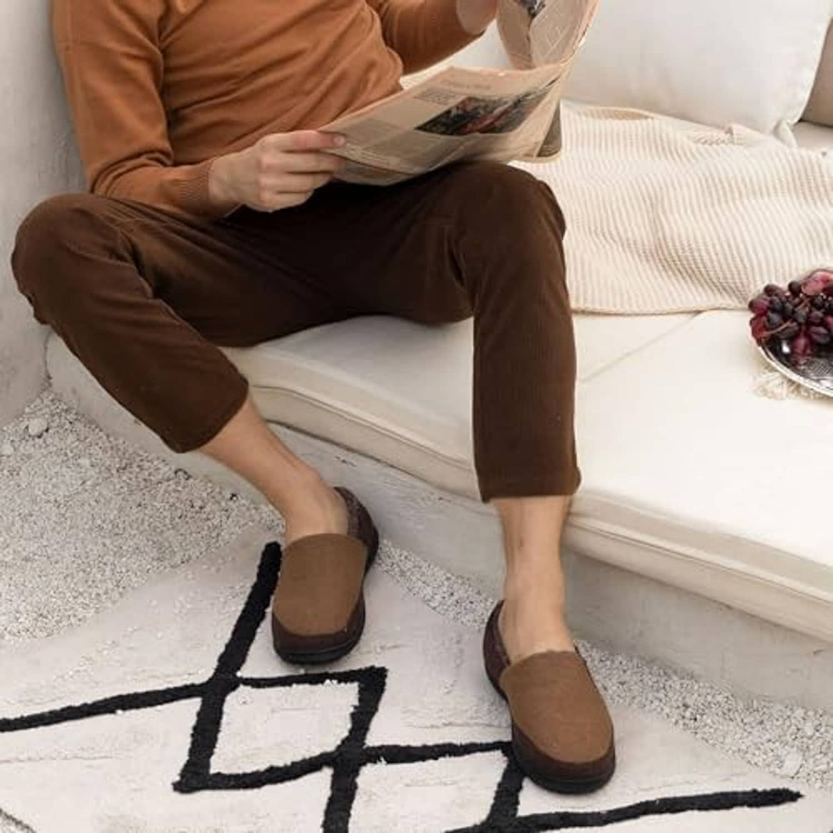 Men’s coffee-brown slippers worn with dark pants and black rubber soles