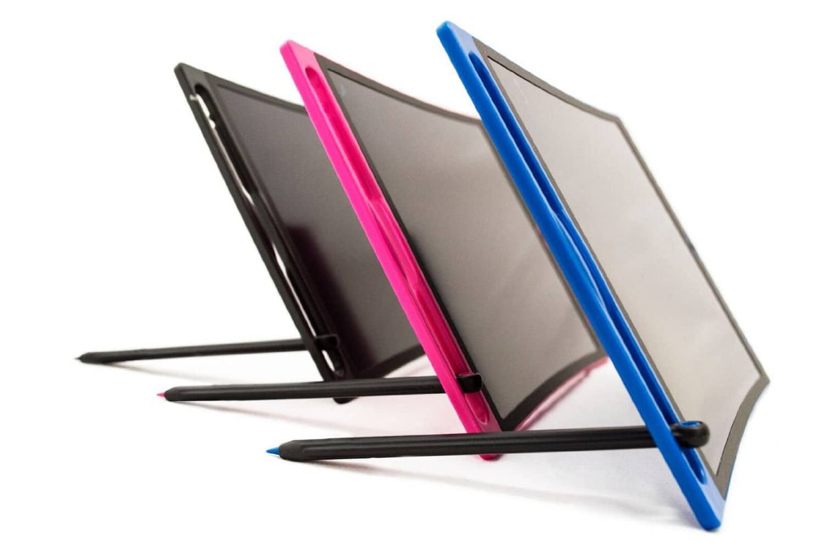 Replacement stylus set: three pens with dark bodies and colored tips on a writing tablet