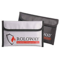 Small fireproof money bag, gray with black trim, Roloway shield logo flap.