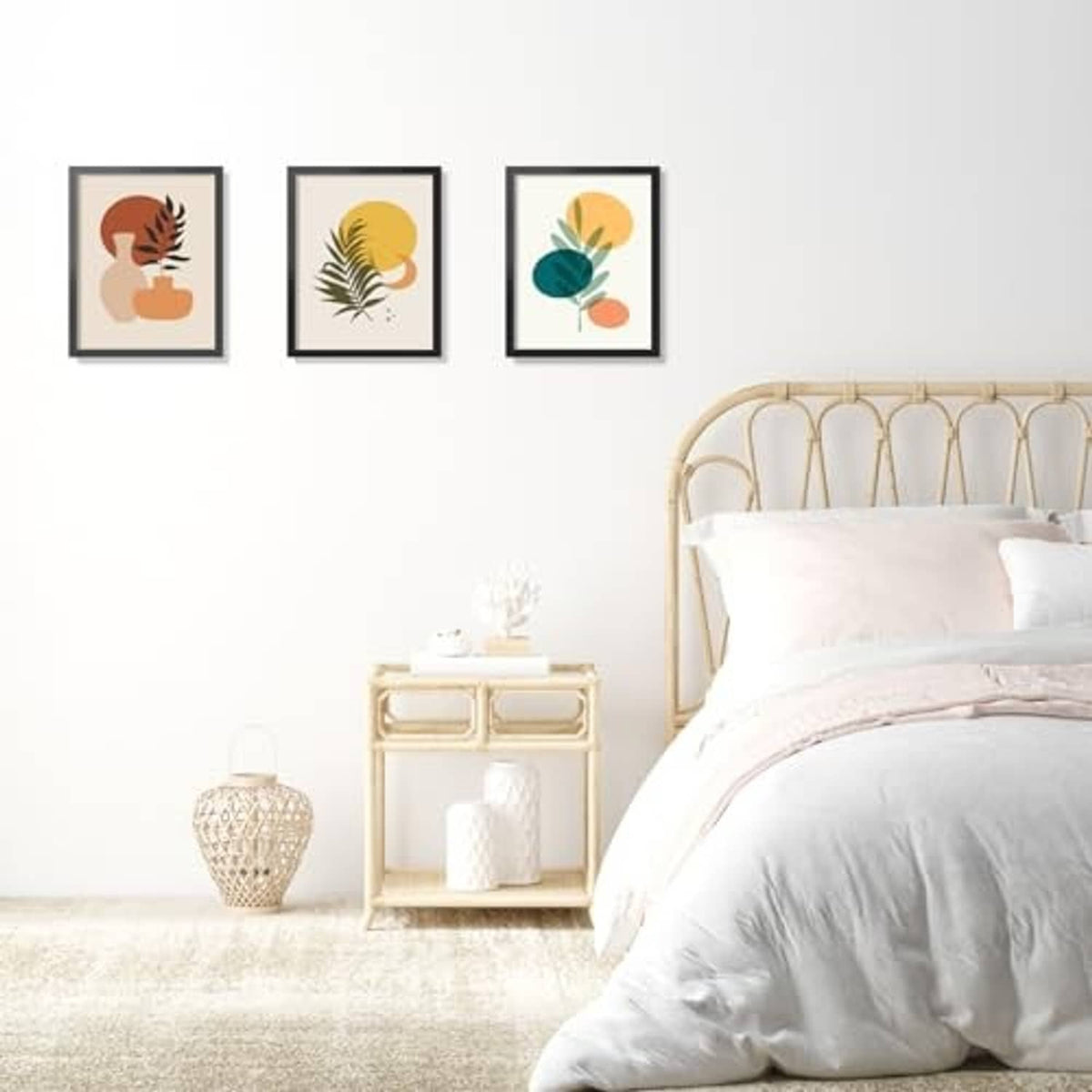 Black wall picture frame set showing small framed botanical prints