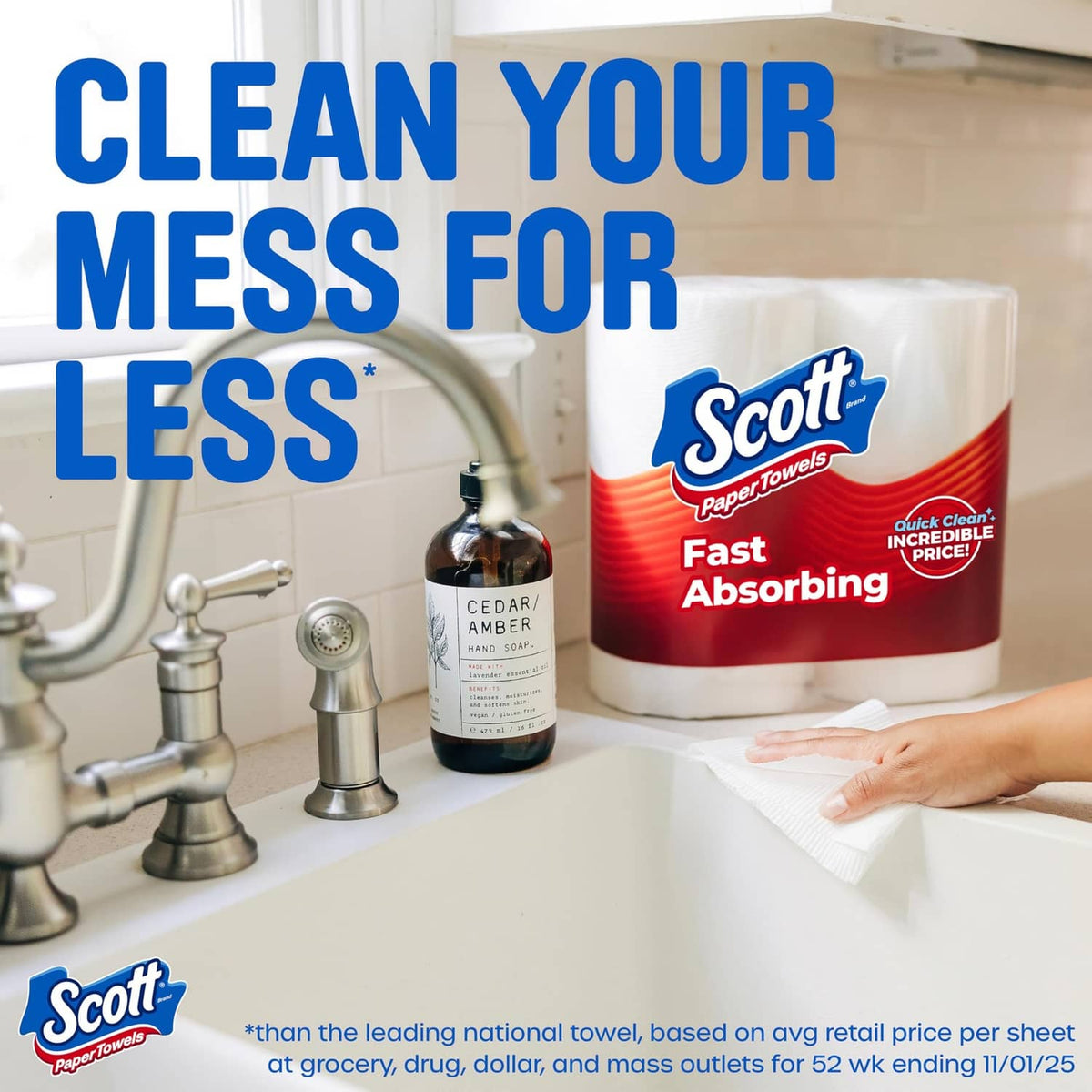 White Scott paper towels roll pack beside bathroom sink; sheet tucked on countertop.