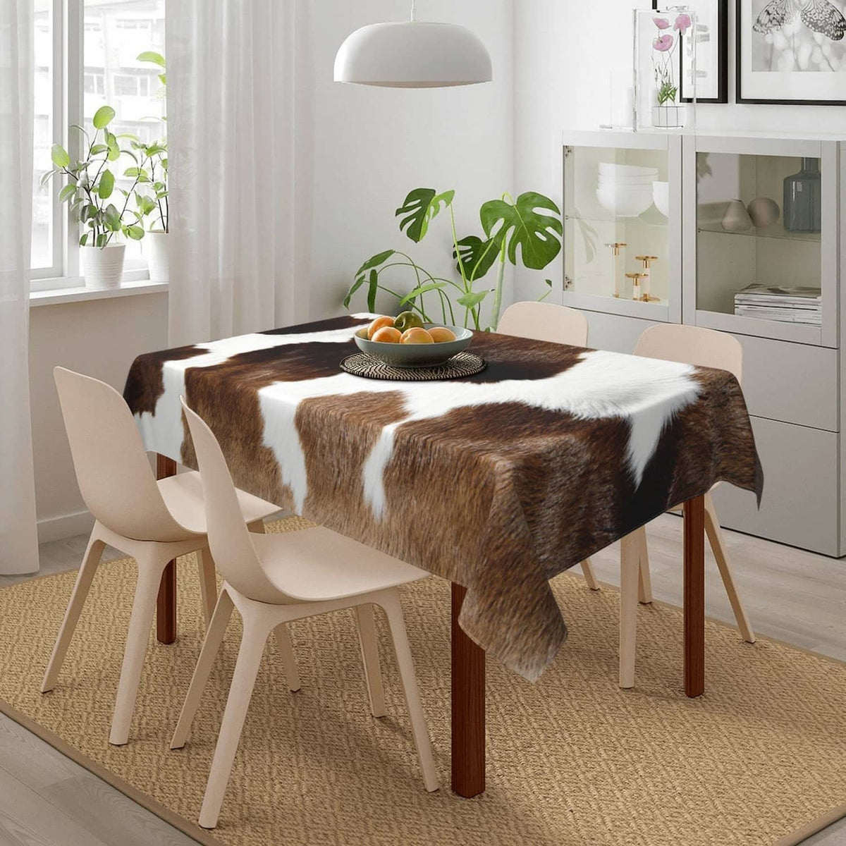 Cow print polyester tablecloth, brown and white patchwork pattern over table