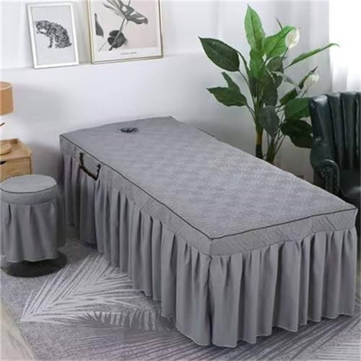 Grey massage table skirt with pleated valance and quilted top cover