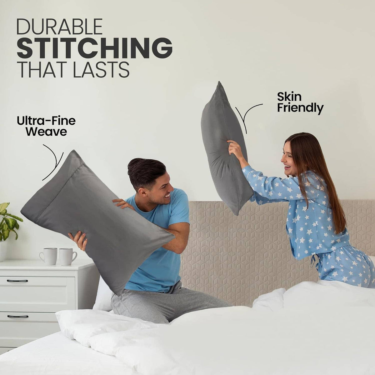 Gray microfiber pillow cover pair with fine weave; durable stitched seams.