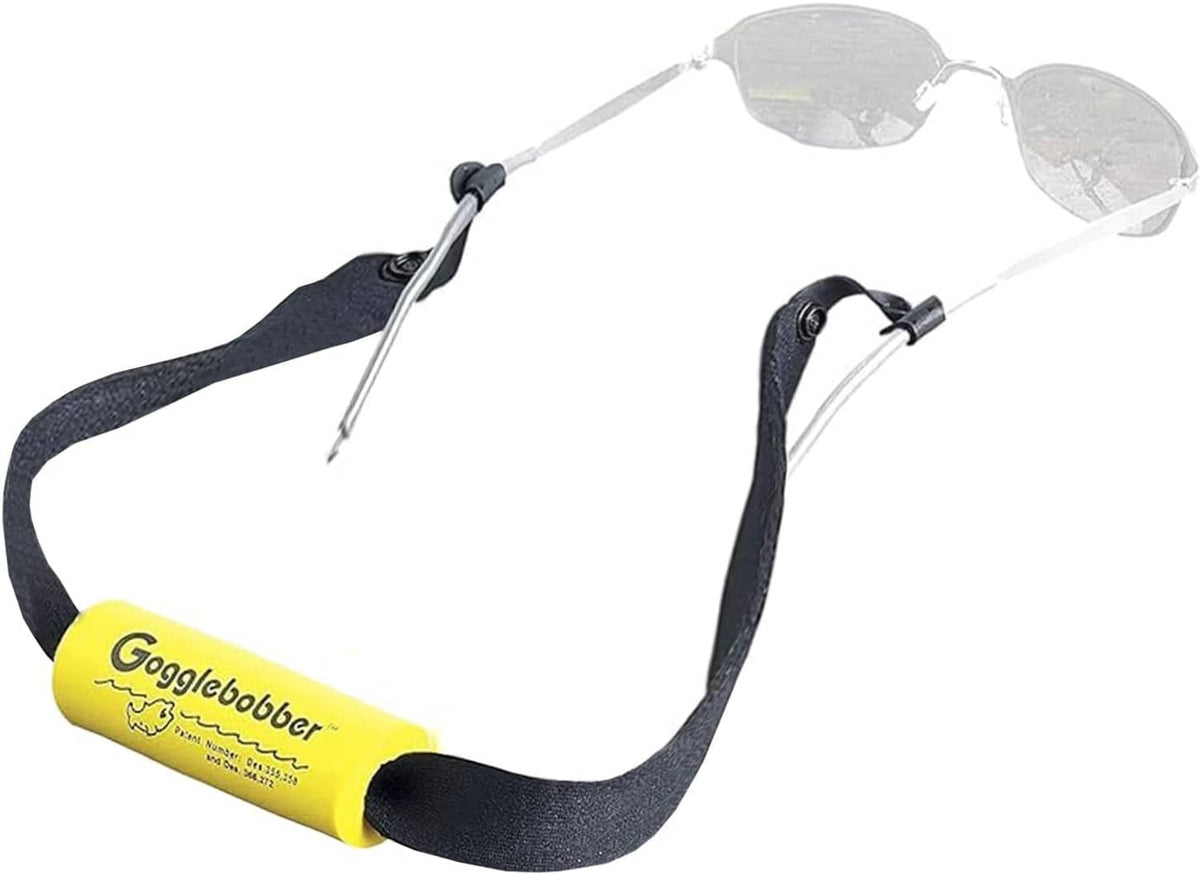Floating eyewear retainer strap with black fabric and yellow foam buoy ends