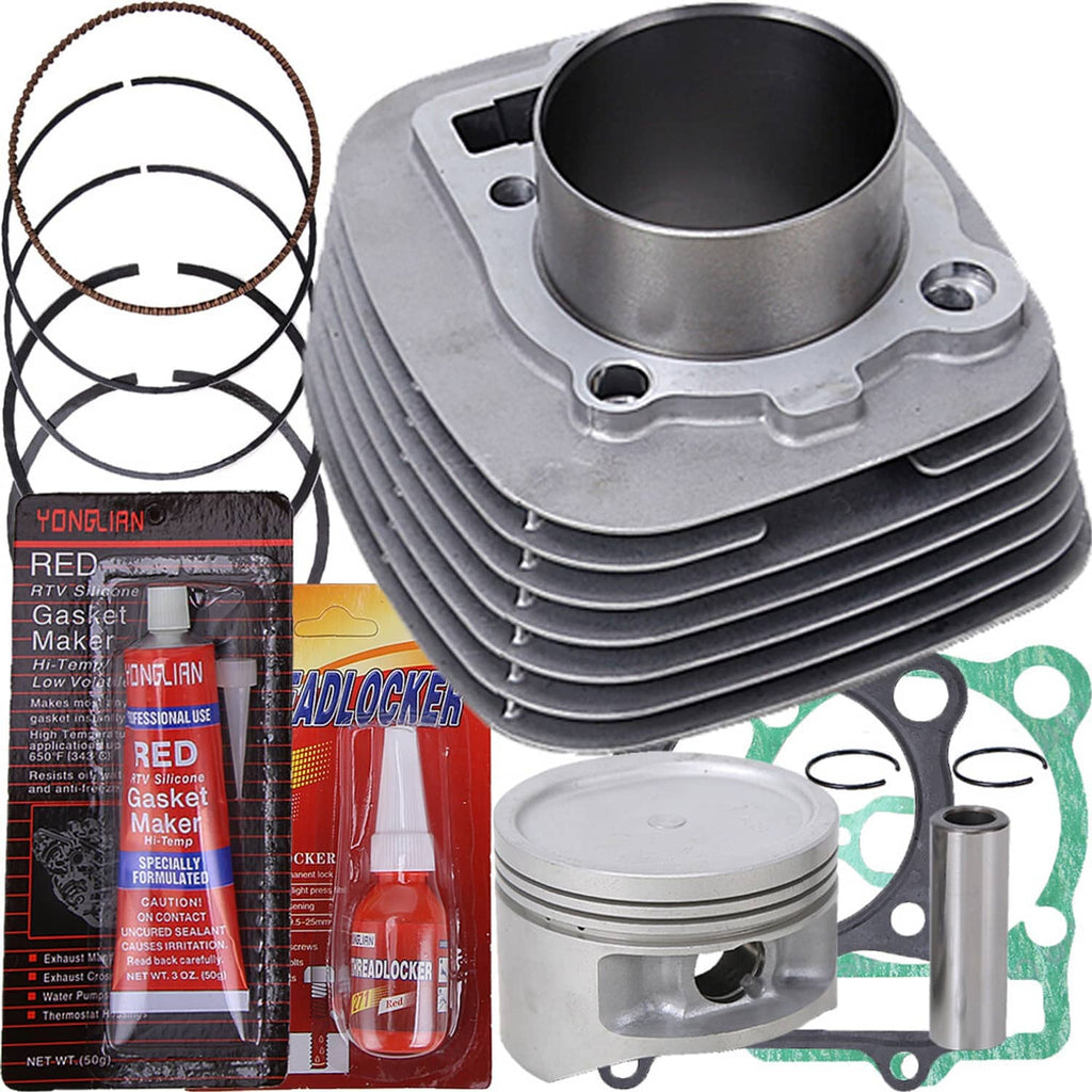 Close view top end kit: aluminum cylinder, piston, rings, and green gasket pieces