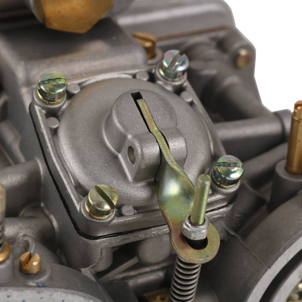 Carburetor kit with metal cover, spring-loaded lever, and mounting screws
