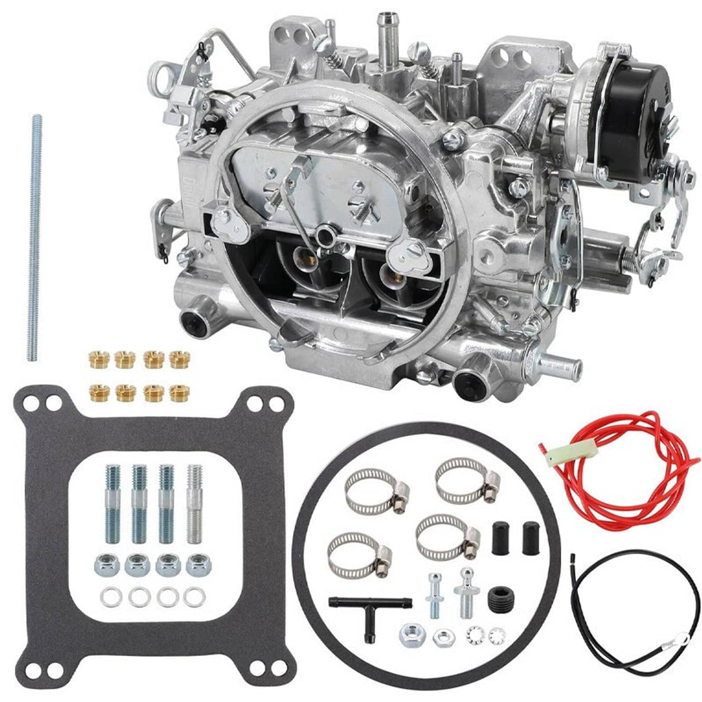 Four-barrel carburetor with included gaskets and small hardware, side view with kit pieces.