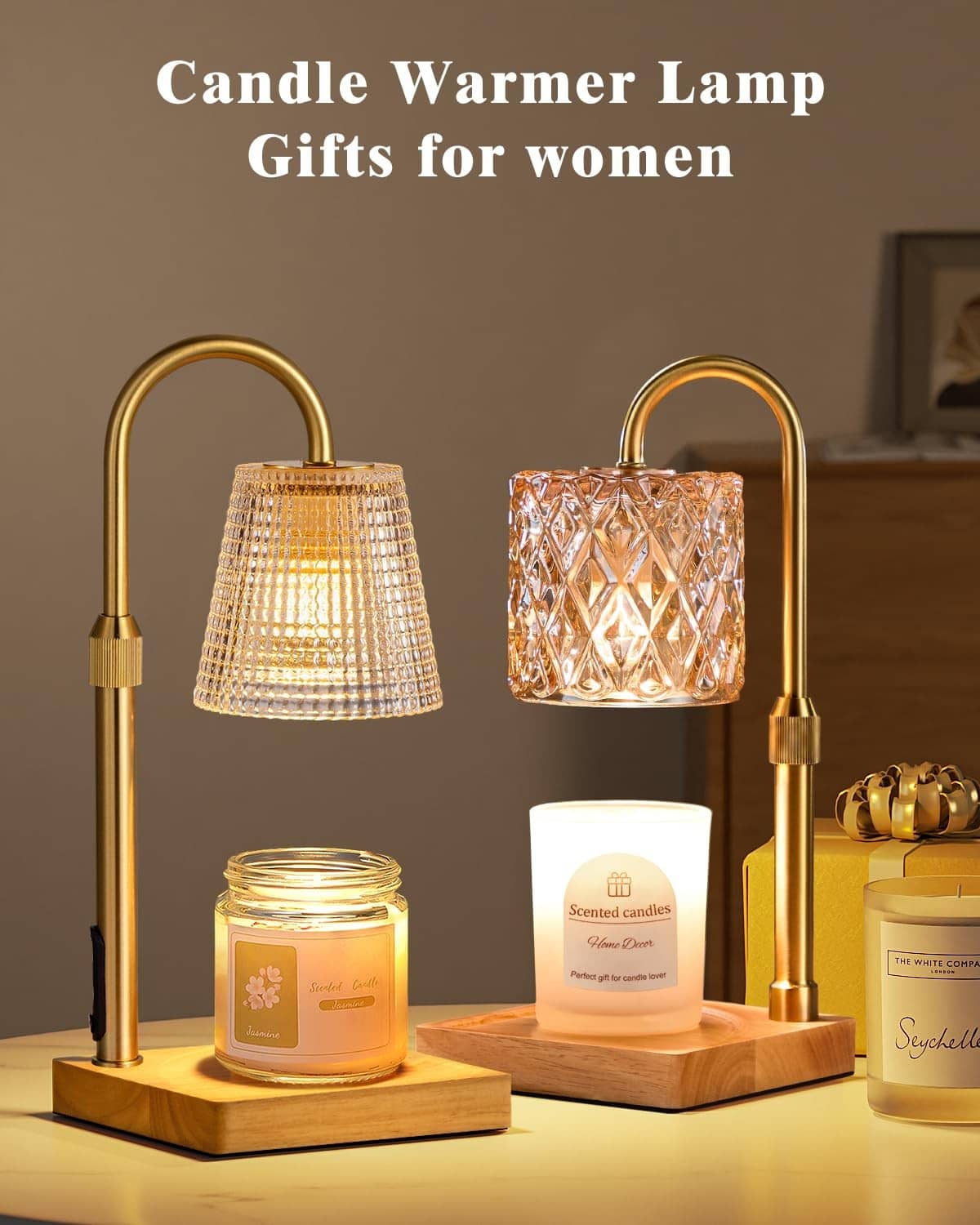 Pair of candle warmer lamps with brass handles and clear shade, shown with different jar candles