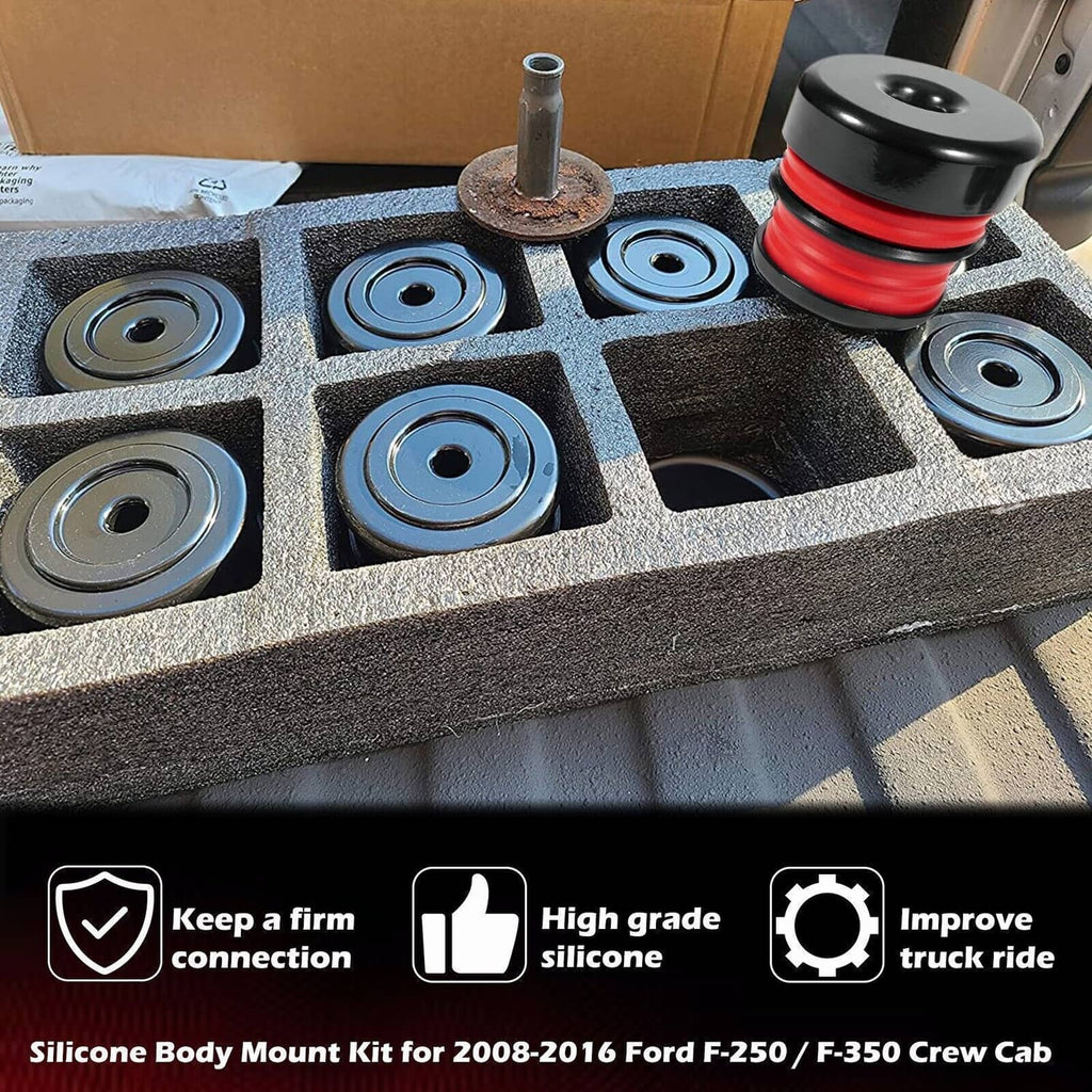 Body mount bushing kit parts in foam insert, black cups with red silicone bushings